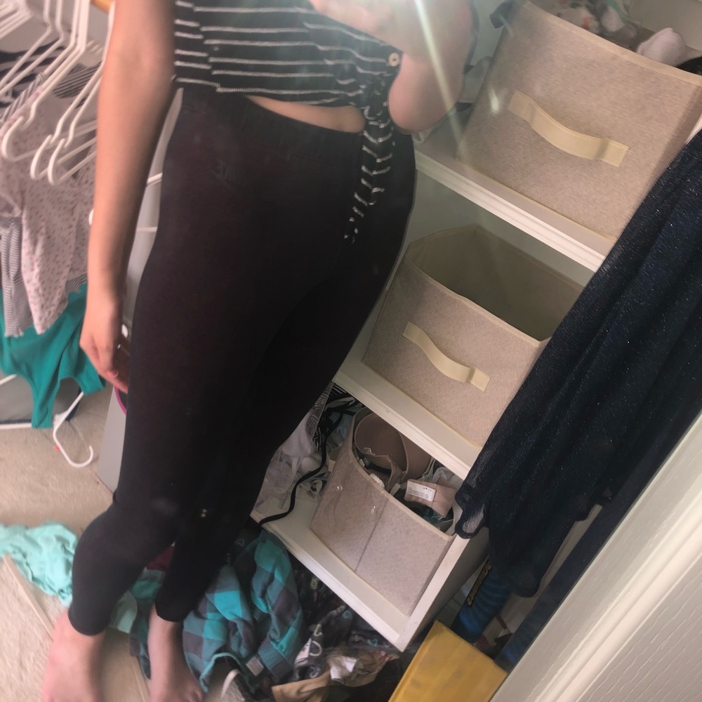 Black nike leggings with just do it on the side